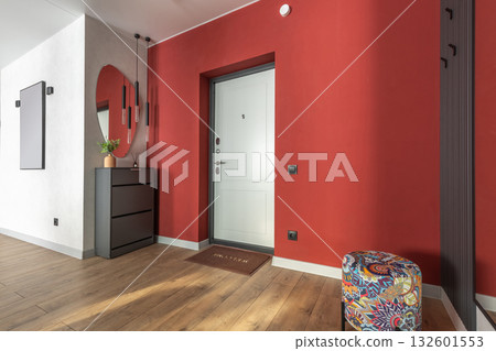 Modern Hallway Interior with Red Wall and Minimalist Decor Modern Hallway Interior with Red Wall and Minimalist Decor 132601553