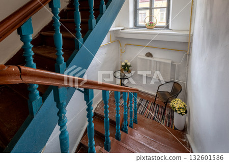 Old Staircase with Blue Railings and Vintage Interior 132601586