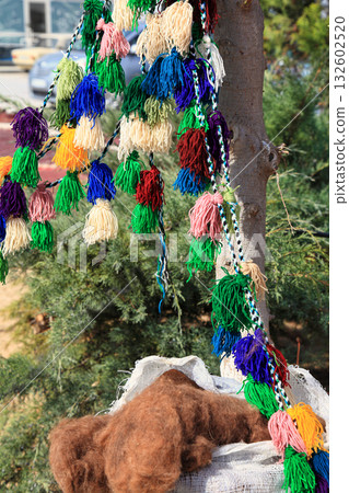 Handmade home decoration. Made from camel and sheep wool. Turkmenistan. Ashkhabad market. Handmade home decoration. Made from camel and sheep wool. Turkmenistan. Ashkhabad market. 132602520