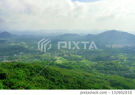 View of the beautiful jungle depths of Yanoda Park on Hainan Island, China. 132602818