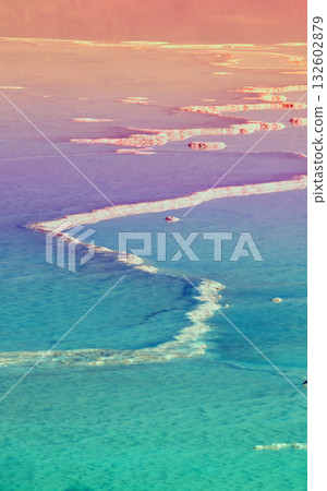 The unique texture of the Dead Sea. Seascape during sunrise. Salty seashore. Israel. Vertical banner The unique texture of the Dead Sea. Seascape during sunrise. Salty seashore. Israel. Vertical banner 132602879