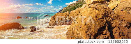 Rocky seascape on a sunny day. View of the sunny bay in Setubal, Portugal. Horizontal banner 132602955