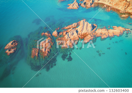 Seascape background. Aerial view. Rocky seashore. Nature rocky background 132603400