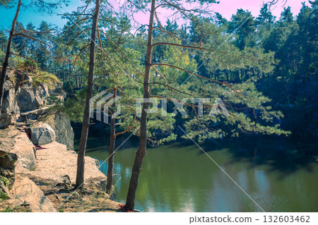 Beautiful rocky lakeshore of mountain lake. Summer landscape. Wilderness, serenity lake Beautiful rocky lakeshore of mountain lake. Summer landscape. Wilderness, serenity lake 132603462