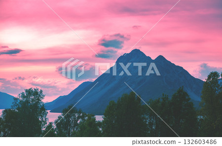 Fjord at sunset. Rocky seashore in the evening. Beautiful nature of Norway. Picturesque Scandinavian landscape. Lofoten islands, Norway Fjord at sunset. Rocky seashore in the evening. Beautiful nature of Norway. Picturesque Scandinavian landscape. Lofoten islands, Norway 132603486