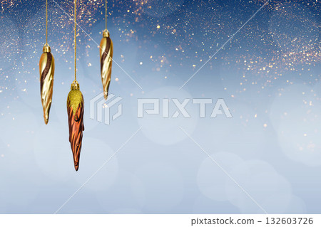Christmas baubles icicles on blue background with white snow and golden lights. Festive winter holiday background. Design with copy space for greeting card, text, advertising, banner, invitation Christmas baubles icicles on blue background with white snow and golden lights. Festive winter holiday background. Design with copy space for greeting card, text, advertising, banner, invitation 132603726