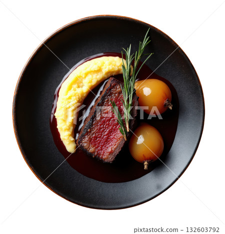 Appetizing braised short rib beef with creamy polenta and savory red wine reduction on dark gourmet plate 132603792