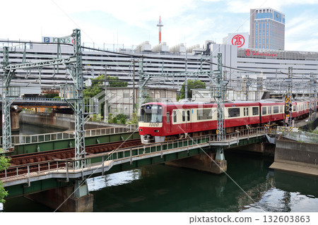Keihin Kyuko Line crossing the railway bridge over the Katabira River in Yokohama 132603863