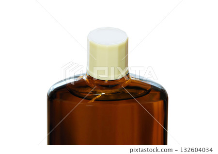 A bottle of hair growth product with a screw cap 132604034