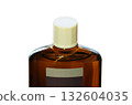 A bottle of hair growth product with a screw cap A bottle of hair growth product with a screw cap 132604035