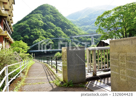 Nikko City Kawaji Onsen: Oga River Promenade, Yakushi Bridge, and Mountain Range Nikko City Kawaji Onsen: Oga River Promenade, Yakushi Bridge, and Mountain Range 132604428