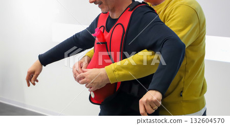 first aid course - company safety - Heimlich maneuver 132604570