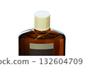 A bottle of hair growth product with a screw cap A bottle of hair growth product with a screw cap 132604709