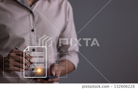 Young man with smartphone mobile hand using a pen touching to sign a Online Business Contract Young man with smartphone mobile hand using a pen touching to sign a Online Business Contract 132606228