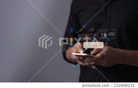 Customer Review, Young Man hand holding Smart Phone with five star to review and give 5 stars 132606232