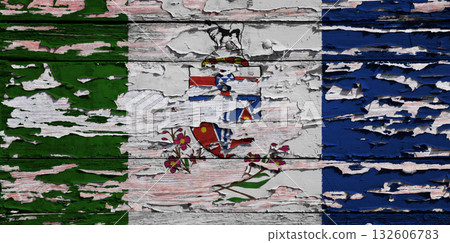 Flag of Yukon painted on a wooden board Flag of Yukon painted on a wooden board 132606783
