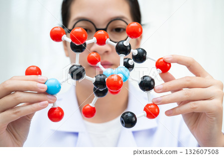 Molecules chemical on a periodic table background. 132607508