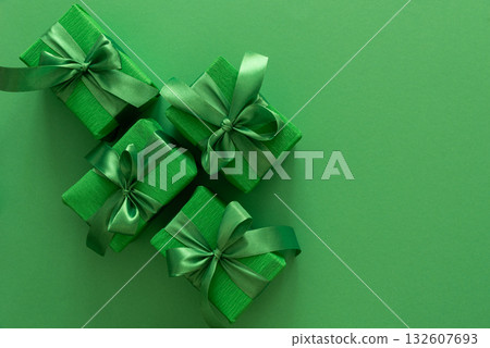 Green Gift Boxes on Solid Green Background with Copy Space Green Gift Boxes on Solid Green Background with Copy Space 132607693