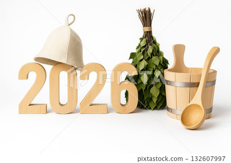 Sauna accessories with birch broom, wooden bucket, ladle, hat next to 2026 numbers on white background, new year wellness concept Sauna accessories with birch broom, wooden bucket, ladle, hat next to 2026 numbers on white background, new year wellness concept 132607997