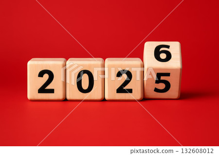 2025 turning to 2026 on wooden blocks with bold black numbers on red background symbolizing new year celebration transformation 2025 turning to 2026 on wooden blocks with bold black numbers on red background symbolizing new year celebration transformation 132608012