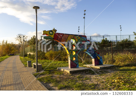 A multi-colored concrete structure in the shape of a wolf or other animal A multi-colored concrete structure in the shape of a wolf or other animal 132608333
