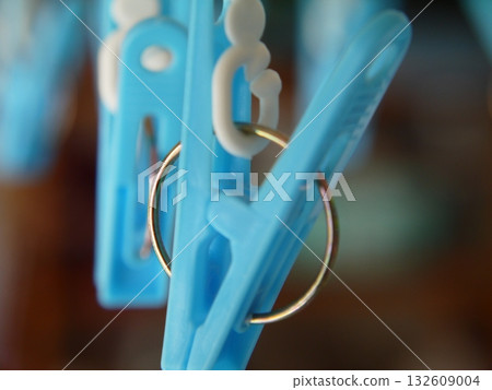 Clothespins on a corner hanger 132609004