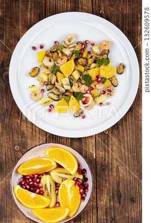 A fresh and colorful seafood salad. 132609578