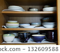 Dishes stored in the cupboard 132609588