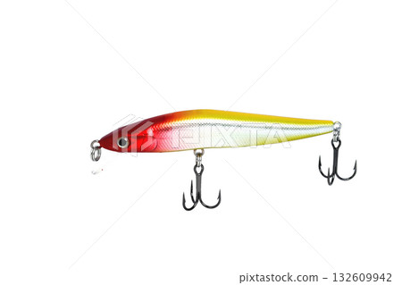 Fishing wobbler with red head, yellow back and white belly. Close-up on a white background. 132609942