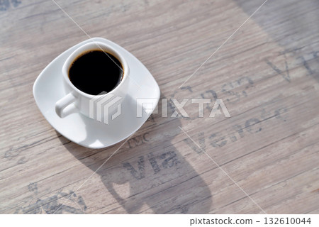 white coffee cup, morning side light background old port oak close-up 132610044