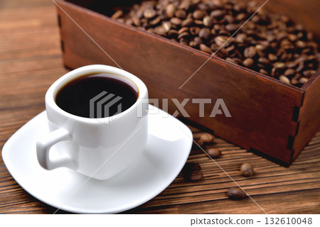 light coffee beans wooden box with coffee, natural wooden background 132610048