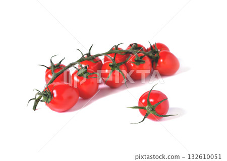 one cherry tomato on a background of cherry twig, white background one cherry tomato on a background of cherry twig, white background 132610051