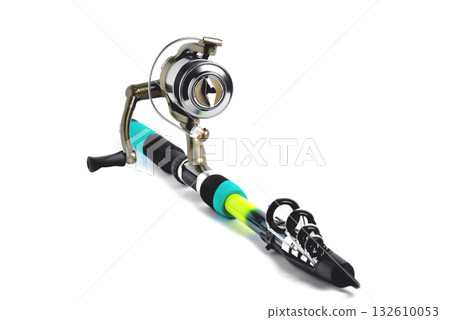 fishing reel on a fishing rod, white background close-up 132610053