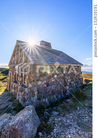 A stone mountain hut bathed in the morning sun - Mount Asahi A stone mountain hut bathed in the morning sun - Mount Asahi 132610191