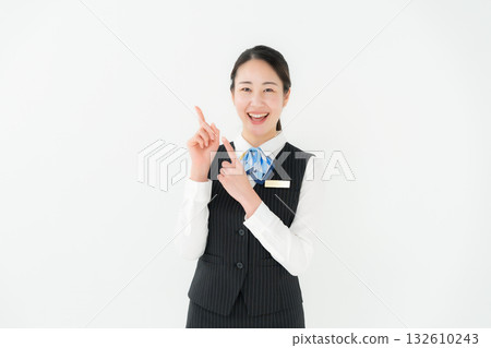 Woman in uniform business pointing 132610243