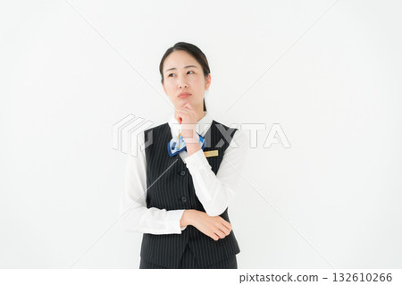 Woman in uniform, business, worries 132610266