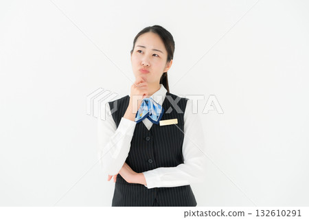 Woman in uniform, business, thinking 132610291