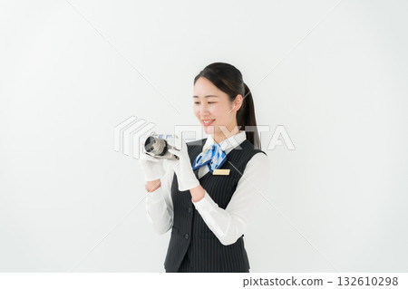 Woman in uniform, business, appraisal, camera Woman in uniform, business, appraisal, camera 132610298