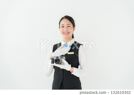 Woman in uniform, business, appraisal, camera 132610302