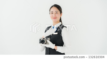 Woman in uniform, business, appraisal, camera Woman in uniform, business, appraisal, camera 132610304