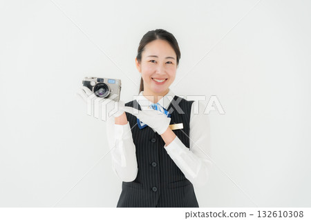 Woman in uniform, business, appraisal, camera Woman in uniform, business, appraisal, camera 132610308