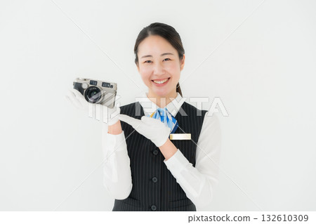 Woman in uniform, business, appraisal, camera Woman in uniform, business, appraisal, camera 132610309