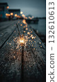 Bright sparks illuminate wooden dock for New Year 132610613