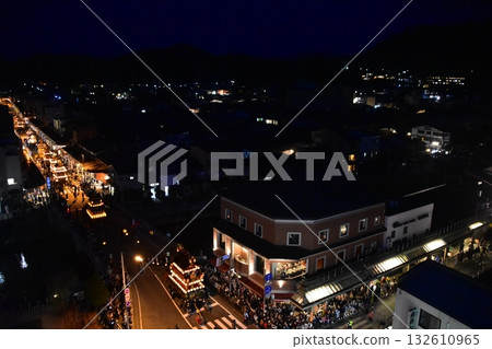 Takayama City, Gifu Prefecture, Japan: Spring Takayama Festival Night Festival: Lantern floats parading after sunset: Aerial view of the street Takayama City, Gifu Prefecture, Japan: Spring Takayama Festival Night Festival: Lantern floats parading after sunset: Aerial view of the street 132610965