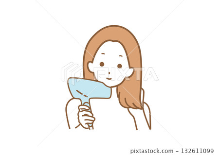 Woman drying her hair Woman drying her hair 132611099