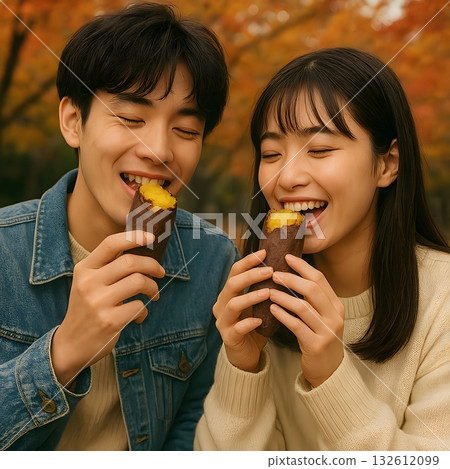 A student couple eating roasted sweet potatoes with relish 132612099