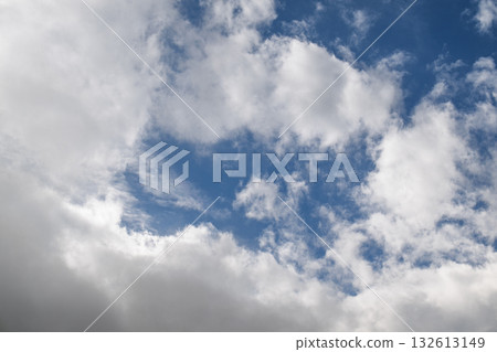 The sky is blue with a few clouds scattered throughout 132613149