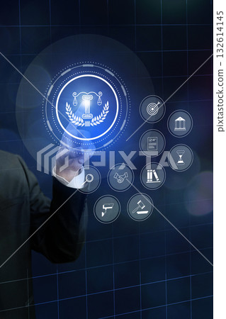 Lawyer using digital interface to explore legal symbols in a modern office setting 132614145