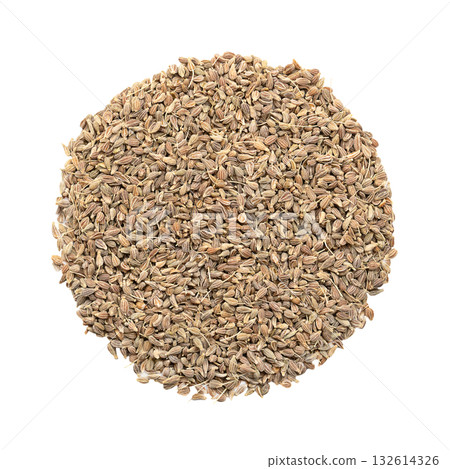 Aniseed, anise seeds, shaped into a circle, isolated from above, on white background. Anise fruits, mistakenly called seeds, from Pimpinella anisum, used to flavor food, candy, and alcoholic drinks. 132614326