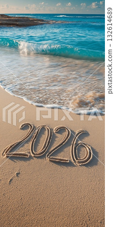 2026 banner. Happy New Year 2026 written on beach sand 2026 banner. Happy New Year 2026 written on beach sand 132614689
